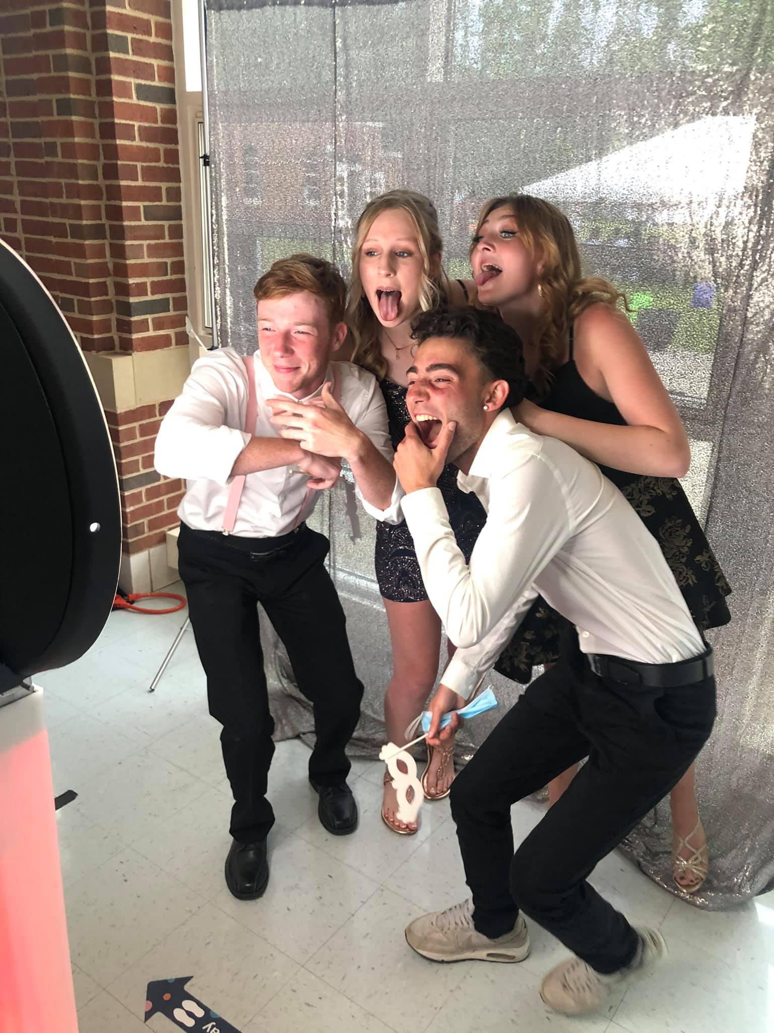 Guests posing in the photo booth